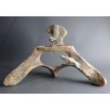 Pacific Northwest Native American Indian Eskimo or Inuit bone carving, depicting a hunter and