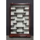 A Chinese snuff bottle display case, a wood hanging case with glass door, size: 31.5"h x 20.25"w
