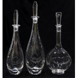 (lot of 3) Group of glass decanters, including (2) Orrefors examples designed by Bjorn Wiinblad,