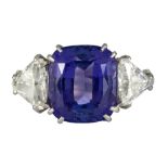 Tanzanite, diamond, 14k white gold ring Featuring (1) cushion-cut tanzanite, weighing