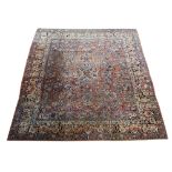 An antique Persian Sarouk carpet, 8'11" x 11'8" Provenance: Claremont Rug Gallery, Oakland, CA