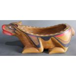 A Pacific Northwest Native American Kwakiutl feasting bowl, in the form of a bear with shell