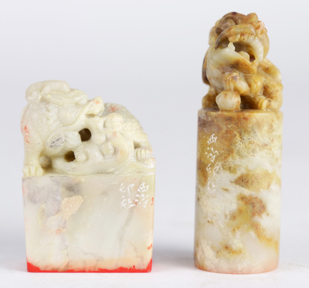 (Lot of 2 )Two carved hardstone seals, one surmounted with carved foo lion and the other with