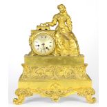 A Napoleon III gilt bronze figural mantel clock, C. F. Petit, Paris, the seated female figure in