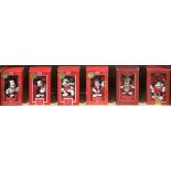 One shelf with (5) Lenox Mickey Mouse Christmas ornaments and a Lenox M&M ornament