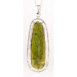 Tourmaline, diamond, 18k white gold pendant-necklace Featuring (1) oval shaped tourmaline