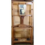 English Art Nouveau hall stand, having a bevel looking glass with marquetry detail, 76"h x 35"w x