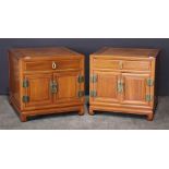 (lot of 2) A pair of Asian style wood night stands, each with one drawer and one dual-panel cabinet,