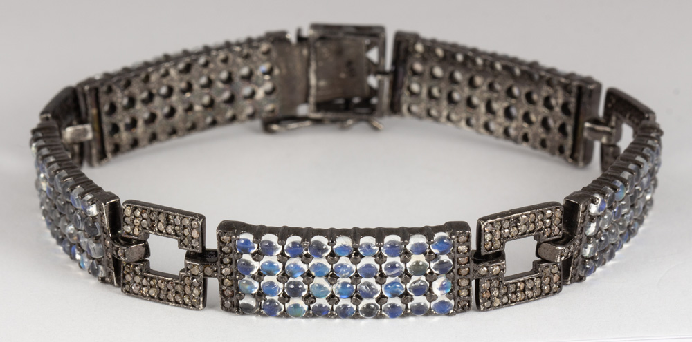 Moonstone, diamond, blackened silver bracelet Featuring (180) round moonstone cabochons, measuring - Image 2 of 3