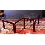 (lot of 2) Contemporary table group, each having a smoke glass top above the mahogany stained