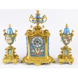 A French ormolu mounted and enamel decorated clock with garniture, likely 19th century, the clock