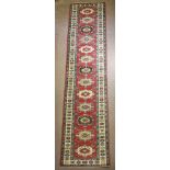 An Uzbek Kazak runner, 2'10" x 17'10"