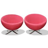 A Pair of Modern swivel lounge chairs, each having a circular red upholstered seat, above chrome