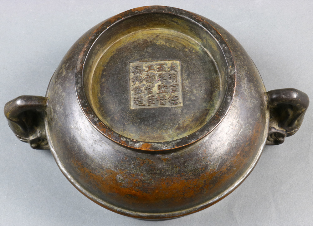 A Chinese Bronze Lidded Censer, of bombe shape and flanked by a pair of elephant handles, a six- - Image 4 of 5