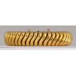 Ciarocchi 18k yellow gold bracelet The 18k yellow gold, wave link, measures approximately 14.3 mm in