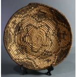 A Southwest Native American Indian Havasupai coiled basketry tray, executed in willow and devil's