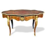 A French boulle style inlaid and gilt mounted occasional table circa 1860, having a turtle top