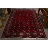 An Afghan Bokhara carpet, 6'11" x 9'5"