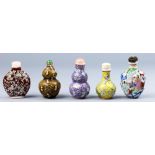 (lot of 5) A group of five Chinese molded porcelain snuff bottles, Two double-gourd snuff bottles,