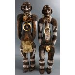 (lot of 2) A pair of Vanuatu male and female figures, Melanesia, executed in clay packed on fiber,