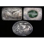 (lot of 3) A Southwest silver belt buckle lot: a Navajo oval sterling buckle with rams by Hyson