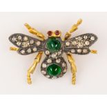 Emerald, diamond, ruby, silver gilt bee brooch Designed as a bee, featuring (2) round emerald