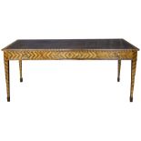 A Louis XV style bureau plat, the rectangular top having an embossed leather writing surface, and