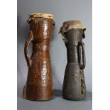 (lot of 2) A grouping of Papua New Guinea drums, the brown and taller one an especially fine