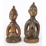 (lot of 2) An African pair of Ibeji twin figures, Yoruba, Nigeria, depicting a male and female,