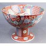 Japanese large footed bowl, Meiji period, interior painted with a courtesan and a geisha amidst