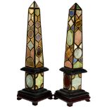 Pair of Continental Neoclassical style specimen marble obelisks, of typical form, each rising on a