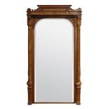 A continental Renaissance style walnut pier mirror circa 1890, having a carved crest surmounting the