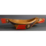 A Pacific Northwest Coast Kwakiutl potlatch cedar bowl, 20th Century, the canoe formed vessel as a