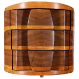 Hawaiian koa wood geometric form jewelry case, having a circular top, above three drawers, underside