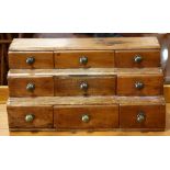 Victorian table top collectors chest, the graduated form with nine drawers, and retains original