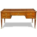 Louis XVI style gilt-metal mounted mahogany writing desk, having an embossed leather writing