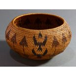 A Native American Indian Washoe coiled basket, Nevada, of bulbous form with continuous triangle