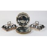 (lot of 8) An Edwardian suite of (6) Sheffield plate chargers and a pair of covered entree dishes,