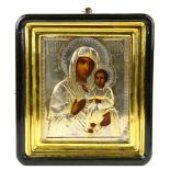 Russian icon, having a silver oklad and depicting the Mother of God, 14"h x 12.5"w