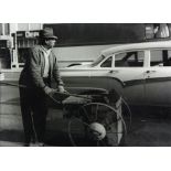 Phil Palmer (American, 20th century), "Street Sweeper," gelatin silver print, 1950, artist stamp