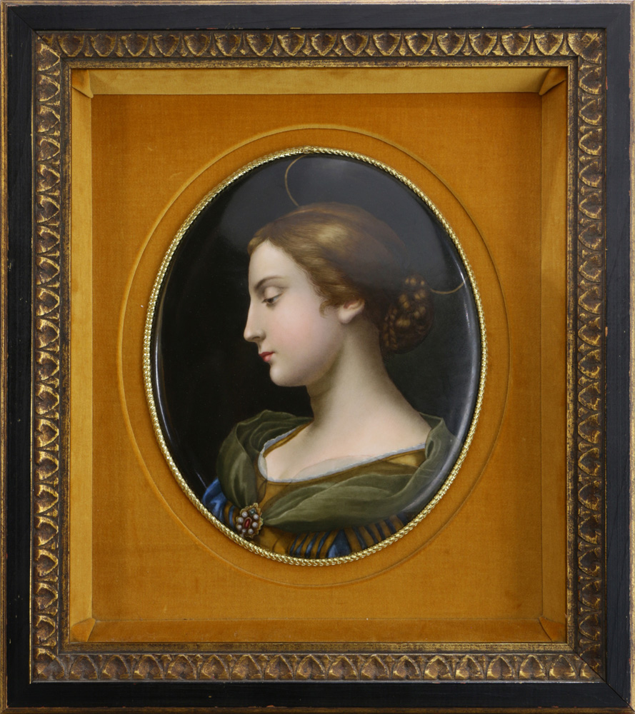 Framed KPM porcelain plaque, depicting a beauty, gazing downward with her hair in a bun, and dressed