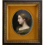 Framed KPM porcelain plaque, depicting a beauty, gazing downward with her hair in a bun, and dressed