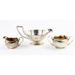(lot of 3) Sterling lot: Gorham sauceboat #A2801 4.5" h x 9"l; together with a Simon Bros matching