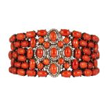 Coral, diamond, blackened silver, 14k yellow gold bracelet Featuring (105) oval and round coral