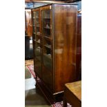 Louis XVI style marquetry decorated vitrine, having two bevel glass doors opening to fixed