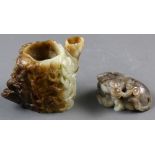 (lot of 2) Two hardstone carvings, the first a recumbent ox, the other a brush pot carved with