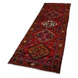 A semi antique Northwest Persian runner, 3'7" x 10'10"