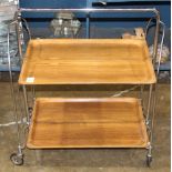 Modern chrome and wood rolling bar cart, having collapsible sides, open: 30"h x 27"w x 16"d