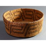 A Southwest Native American Indian Pima or Papago coiled basket on a bundle foundation, Southern