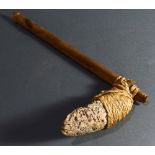 An Oceanic adze, with a shell scoop, many signes of age and use, 13"h; Provenance: Richard I.M.